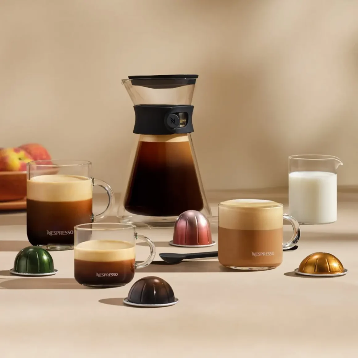 a coffee maker and cups of coffee