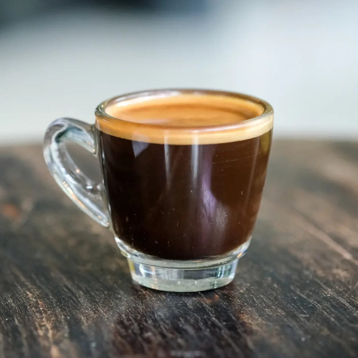 a glass cup of doppio espresso