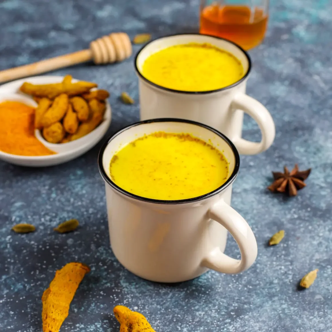 two cups of turmeric coffee