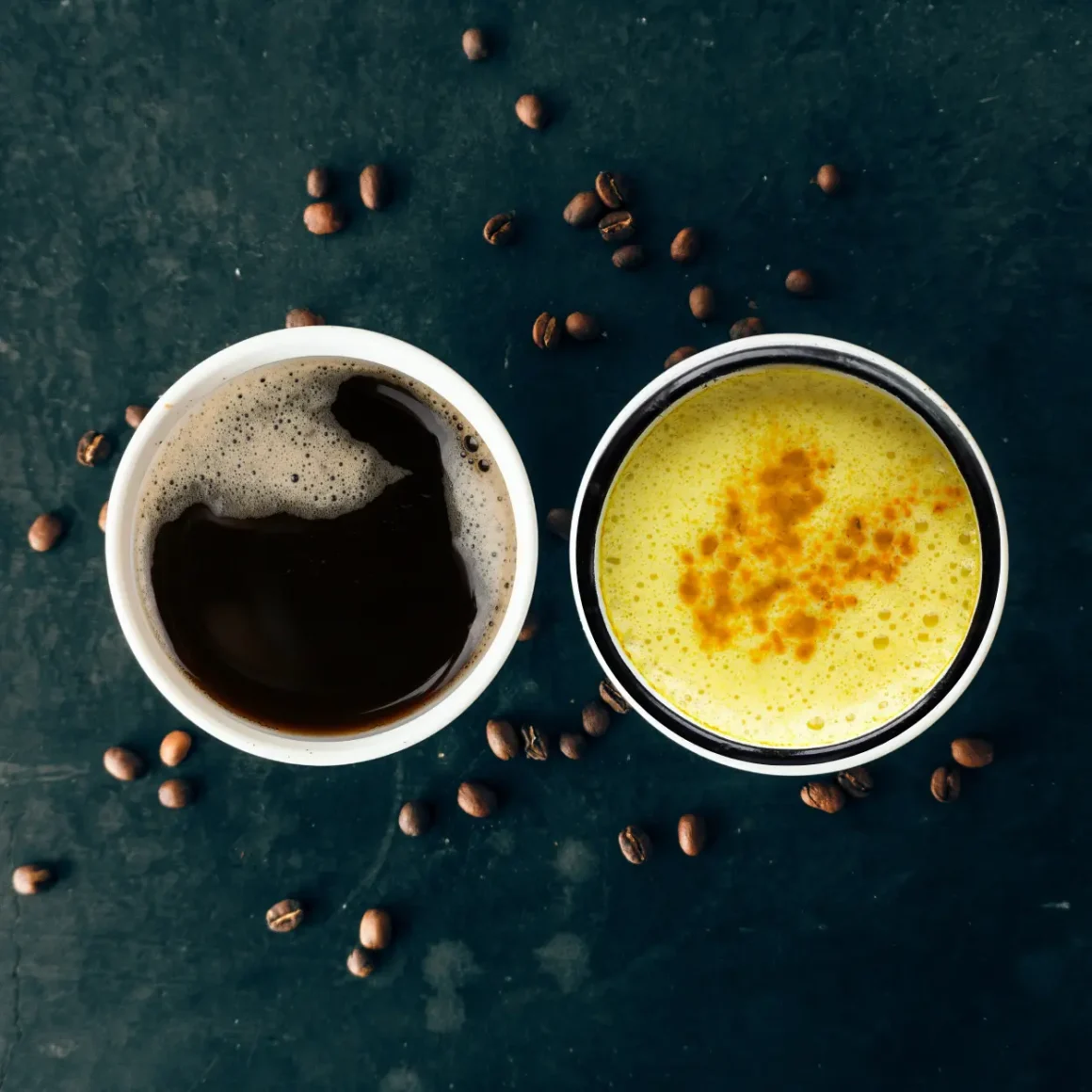 two cups of traditional coffee and a turmeric coffee
