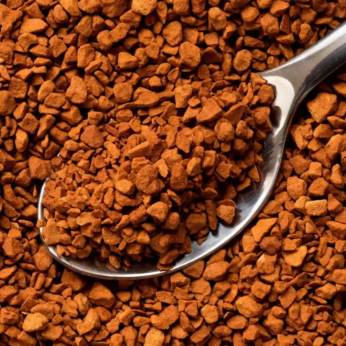 a spoonful of instant espresso coffee