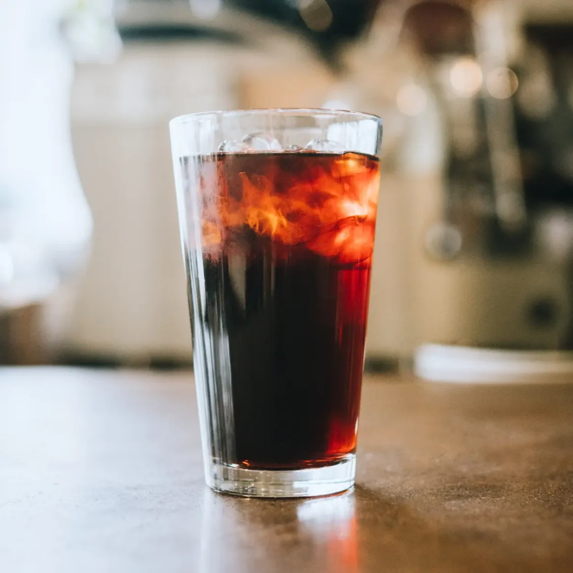a glass of cold brew coffee with ice