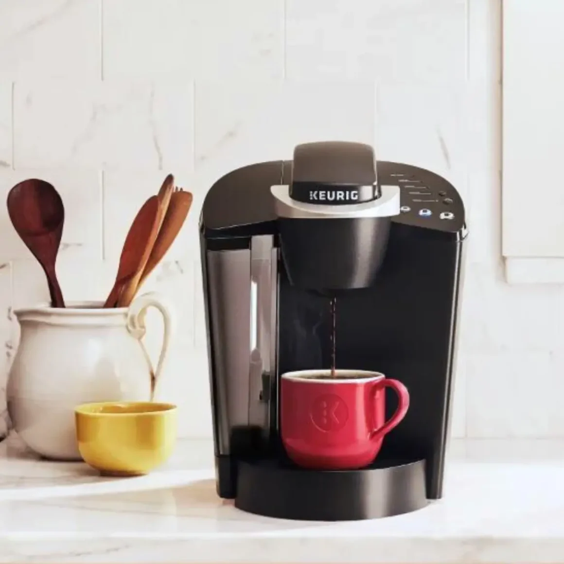 a keurig k-classic coffee maker on a counter
